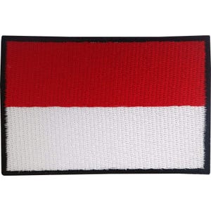 May include: A rectangular embroidered patch featuring a horizontal bicolor design with a solid red upper half and a solid white lower half. The entire design is framed by a thin, solid black border that outlines the rectangular shape of the patch.