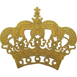 May include: A gold-coloured embroidered crown patch featuring intricate threadwork and a central cross-topped finial. The design includes decorative cutouts and a scalloped base, showcasing a metallic sheen throughout the entire stitched pattern.