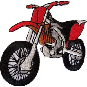 May include: An embroidered iron-on patch shaped like a dirt bike. The motorcycle features a vibrant red front mudguard and seat, a black frame and tyres, and silver-grey engine and wheel details. The design is outlined in black thread.