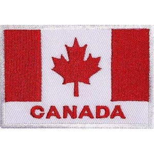 May include: A rectangular embroidered patch featuring the Canadian flag design with two red vertical bars on the sides and a central white square containing a red maple leaf. The word CANADA is embroidered in red capital letters at the bottom.