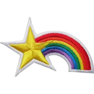 May include: An embroidered patch featuring a bright yellow five-pointed star with a trailing rainbow arc. The rainbow consists of red, orange, yellow, green, blue, and purple bands. The entire design is outlined with a thick white border.