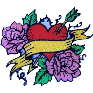 May include: An embroidered patch featuring a central red heart pierced by an arrow, flanked by two pink roses with green leaves. A blank yellow banner with dark blue borders wraps across the heart, all outlined in a dark blue thread.