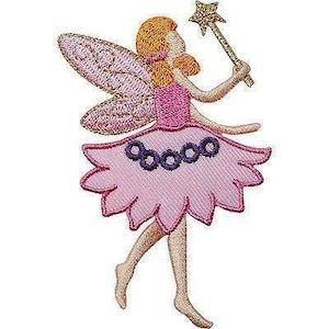 May include: An embroidered patch of a fairy with orange hair, wearing a pink bodice and a light pink skirt with dark purple circular accents. The fairy has light pink wings and holds a gold star-tipped wand in an upright position.