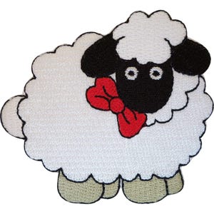 May include: An embroidered patch shaped like a fluffy sheep with white wool, a black face, and black ears. The sheep features a bright red bow tie around its neck and has four light-coloured hooves at the bottom. The design is outlined in black.