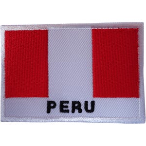 May include: A rectangular embroidered patch featuring the flag of Peru with two vertical red bands on the sides and a white central band. The word PERU is stitched in bold black capital letters across the bottom white section of the patch.