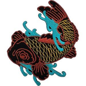 May include: An embroidered patch featuring a koi fish in a swimming motion. The fish has a black body with yellow scale detailing, red fins, and red facial markings. It is surrounded by stylised bright blue water waves and splashes.