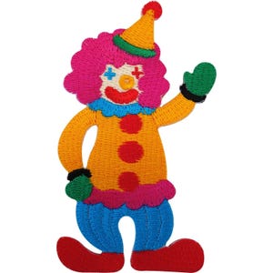 May include: An embroidered patch of a clown with bright pink hair, a yellow cone hat with a green brim, and a yellow suit featuring three red circular buttons. The clown has blue trousers, red shoes, green gloves, and a blue ruffled collar.