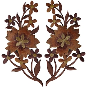 May include: A pair of symmetrical iron-on patches featuring embroidered floral arrangements in shades of brown, copper, and gold. Each patch displays a large central flower surrounded by smaller blossoms, stems, and leaves with detailed stitching.