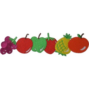 May include: A horizontal row of embroidered fruit patches featuring a cluster of purple grapes, a red apple, a green apple, a red strawberry, a yellow pineapple, and an orange. Each patch displays detailed stitching and vibrant colors.