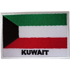 May include: A rectangular embroidered patch featuring the flag of Kuwait with horizontal green, white, and red stripes and a black trapezoid on the left side. The word KUWAIT is stitched in bold black capital letters on the bottom white border.