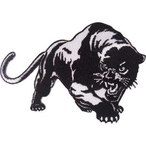 May include: An embroidered patch featuring a black and white panther in a prowling stance. The design shows the panther with its mouth open, baring teeth, and its tail curved upward. The high-contrast stitching creates a detailed feline figure.