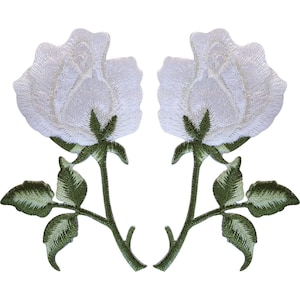May include: Two identical embroidered patches featuring white rose blossoms with detailed green stems and leaves. Each patch displays a single rose flower with layered petals, a green calyx, and a stem with two distinct green leaves attached.