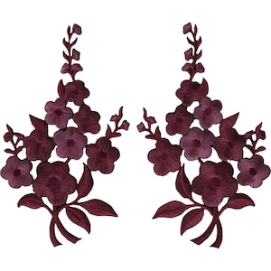 May include: A pair of matching dark burgundy floral embroidered patches. Each patch features a vertical arrangement of five-petaled flowers, buds, and pointed leaves, all rendered in a deep, monochromatic wine-coloured thread with visible stitching.