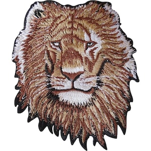 May include: An embroidered patch featuring the detailed head of a lion with a full mane. The design uses shades of golden brown, tan, white, and black thread to create the facial features, eyes, and textured fur, finished with a black border.