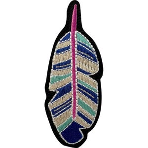 May include: An embroidered feather patch featuring a vibrant magenta central spine. The feather is composed of alternating horizontal bands of navy blue, light beige, and mint green thread, all outlined with a thick black border.