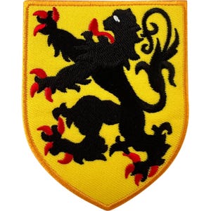 May include: A shield-shaped embroidered patch featuring a yellow background with a black lion rampant. The lion has red claws and a red tongue, with a white eye. The patch is finished with a thick, golden-yellow stitched border around the edge.