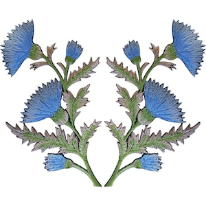 May include: Two symmetrical embroidered patches featuring blue thistle flowers with green stems and serrated leaves. Each patch displays a large blooming flower at the top, a secondary flower in the middle, and a small bud at the bottom.