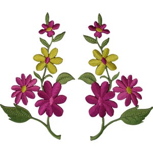 May include: Two symmetrical embroidered floral patches featuring vibrant magenta and yellow flowers with green stems and leaves. Each patch displays a vertical arrangement of blossoms, showcasing detailed stitching and bright, contrasting colours.