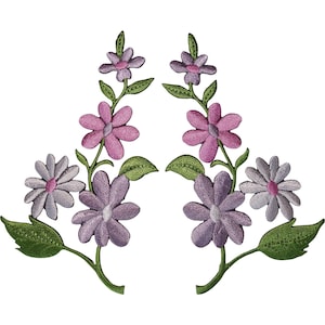 May include: Two symmetrical embroidered patches featuring purple and lavender flowers with green stems and leaves. Each patch displays a vertical arrangement of three blossoms in varying shades of purple, accented by green foliage on a white background.
