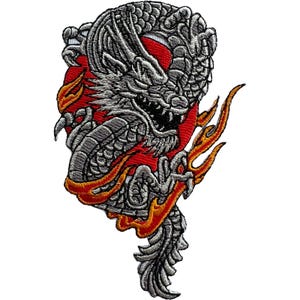May include: An embroidered patch featuring a detailed silver and grey dragon coiled around a solid red circular background. The dragon is surrounded by stylised orange and yellow flames that frame the lower and side portions of the design.