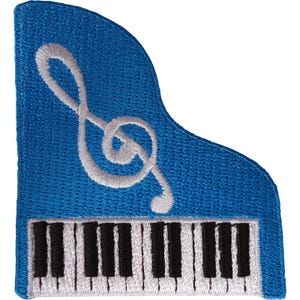 May include: An embroidered patch shaped like a grand piano in bright blue thread. The design features a white treble clef symbol on the body and a horizontal row of black and white piano keys along the bottom edge, all finished with a blue border.