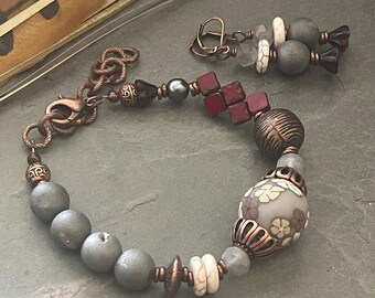 Floral bracelet, gray, burgundy, red.  Copper bracelet and earrings