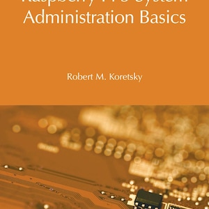 May include: A book titled Raspberry Pi 5 System Administration Basics by Robert M. Koretsky. The cover features a solid orange top section with white text and a bottom section showing a blurred, golden-brown electronic circuit board.