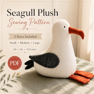 以下が含まれることがあります： Seagull Plush Sewing Pattern, 3 Sizes Included, Small, Medium, Large, A0, A4, US Letterと書かれたカモメのぬいぐるみのPDF型紙。画像には、白い体にダークグレーの翼、オレンジ色のくちばしと足を持つカモメのぬいぐるみが写っています。
