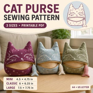 May include: A sewing pattern for a cat-shaped purse, featuring three sizes in a printable PDF format. The image displays three finished purses in purple, blue, and green fabric with star patterns, gold zippers, and a small fish-shaped zipper pull.