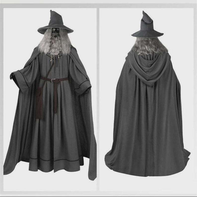 May include: A grey wizard costume featuring a long-sleeved robe with a dark brown belt, a matching hooded cloak, and a tall pointed hat. The ensemble includes a long, textured grey wig and beard, providing a complete look for the character.