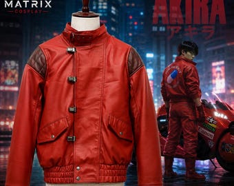 May include: A bright red jacket with a high collar, a buckled strap at the neck, and four silver-toned metal buckles down the front. The jacket features dark brown quilted shoulder panels, two front flap pockets, and a ribbed elastic waistband.