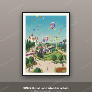May include: A framed art print featuring a colourful amusement park scene with a white castle, a monorail track, green trees, flower beds, and people walking on paths. The sky is filled with numerous floating balloons and two purple jellyfish.