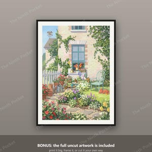 May include: A framed art print depicting a brick house exterior with a blue window, a white picket fence, and a garden filled with colourful flowers in pots. A small orange creature sits in the window, and a green chair sits on the lawn.
