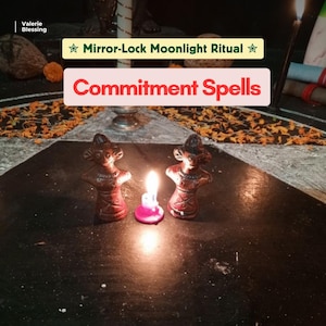 May include: Two brown clay figurines stand on a black surface flanking a small lit pink candle. Text overlays read Valerie Blessing, Mirror-Lock Moonlight Ritual, and Commitment Spells. The scene is illuminated by the candle flame in a dark setting.