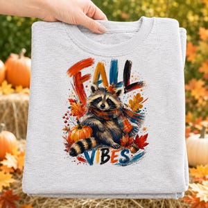 Fall Vibes PNG, Watercolor Raccoon Sublimation Design with Pumpkins and Leaves
