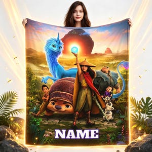 May include: A rectangular fleece blanket featuring a vibrant, full-color graphic print of characters from the movie Raya and the Last Dragon, including a blue dragon, a warrior, and a pill-bug creature. The word NAME is printed in white block letters.