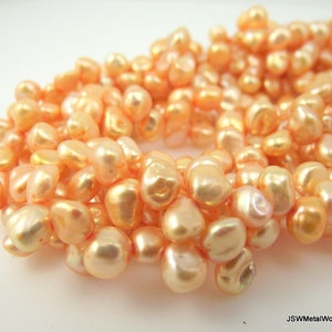 6 mm bis 7 mm Pfirsich Keshi Süßwasserperle, Pfirsich Keishi Corn Flake Süßwasserperle, 6 mm - 7 mm, 16-Zoll-Strang
