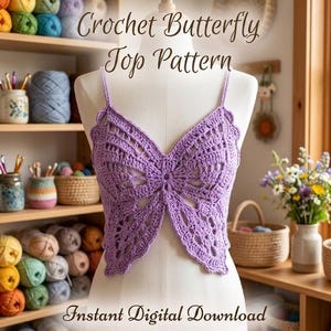 May include: A lavender crochet top shaped like a butterfly with thin straps, displayed on a white mannequin. The text "Crochet Butterfly Top Pattern" and "Instant Digital Download" is overlaid on the image in a dark brown script font.