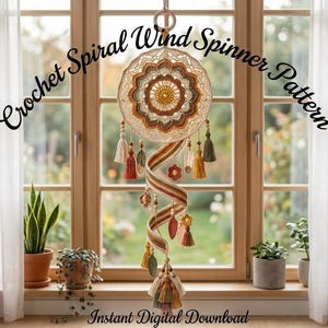 May include: A crochet spiral wind spinner with a circular mandala top in shades of cream, mustard yellow, olive green, and terracotta. The design features hanging tassels, small wooden beads, and leaf-shaped accents. Text reads Crochet Spiral Wind Spinner Pattern and Instant Digital Download.