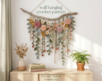 May include: A wall hanging crochet pattern featuring a driftwood branch adorned with various crocheted flowers, leaves, and butterflies in muted tones of pink, yellow, green, and blue. The text wall hanging crochet pattern and Instant Digital Download are visible.