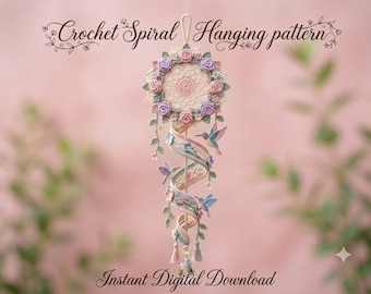 May include: A crochet spiral hanging decoration featuring a circular mandala top adorned with pink and purple roses. A spiraling ribbon descends, decorated with small flowers, green leaves, and three hummingbirds. Text reads: Crochet Spiral Hanging pattern, Instant Digital Download.