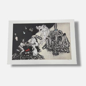 May include: A black and white lithograph print featuring a surreal scene with a large ornate chandelier, a floating figure, and two people kneeling on a rocky base. The composition includes a prominent red arrow and several smaller white arrows.