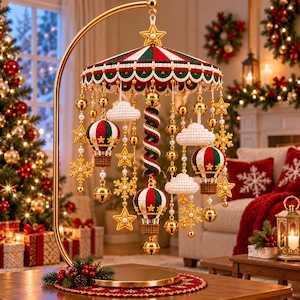 May include: A decorative carousel mobile featuring red, green, and white striped fabric canopies, three miniature hot air balloons, white crocheted clouds, gold-toned star ornaments, snowflake charms, and hanging metallic jingle bells.