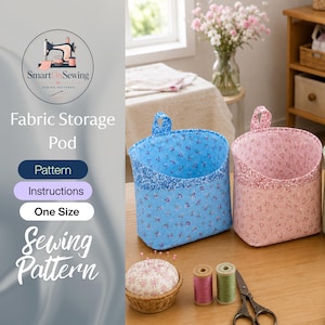 May include: Two fabric storage pods, one blue and one pink, both featuring a small floral print and a hanging loop. The image includes text: SmartOnSewing, Fabric Storage Pod, Pattern, Instructions, One Size, and Sewing Pattern.