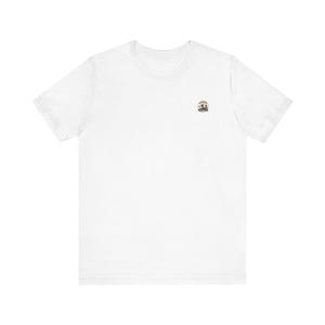May include: A plain white short-sleeve t-shirt featuring a small, circular graphic logo on the left chest area. The logo contains a detailed illustration of a person and text that reads "BORN TO BE WILD" in a circular border design.