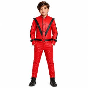May include: A bright red faux leather jacket and matching trousers set featuring bold black V-shaped stripes across the chest and shoulders. The jacket includes a high collar, snap button closures, and ribbed shoulder detailing, paired with black boots.