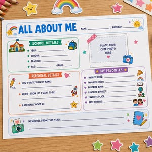 May include: A white paper activity sheet titled ALL ABOUT ME with sections for school details, personal details, and favourites. The sheet features colourful illustrations of a school, backpack, rocket, camera, and stars, with blank lines for writing.