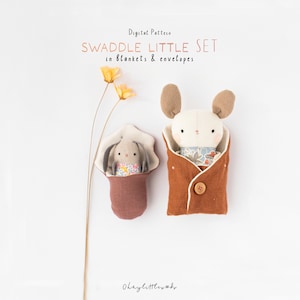 May include: Digital pattern for a swaddle little set in blankets and envelopes. The pattern includes two stuffed animals, a bunny and a mouse, both wrapped in blankets.