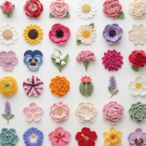 May include: A collection of thirty-six individual crochet flower and succulent appliques arranged in a grid. The set features various species including roses, daisies, sunflowers, pansies, lilies, cacti, and orchids in red, pink, yellow, blue, and green.