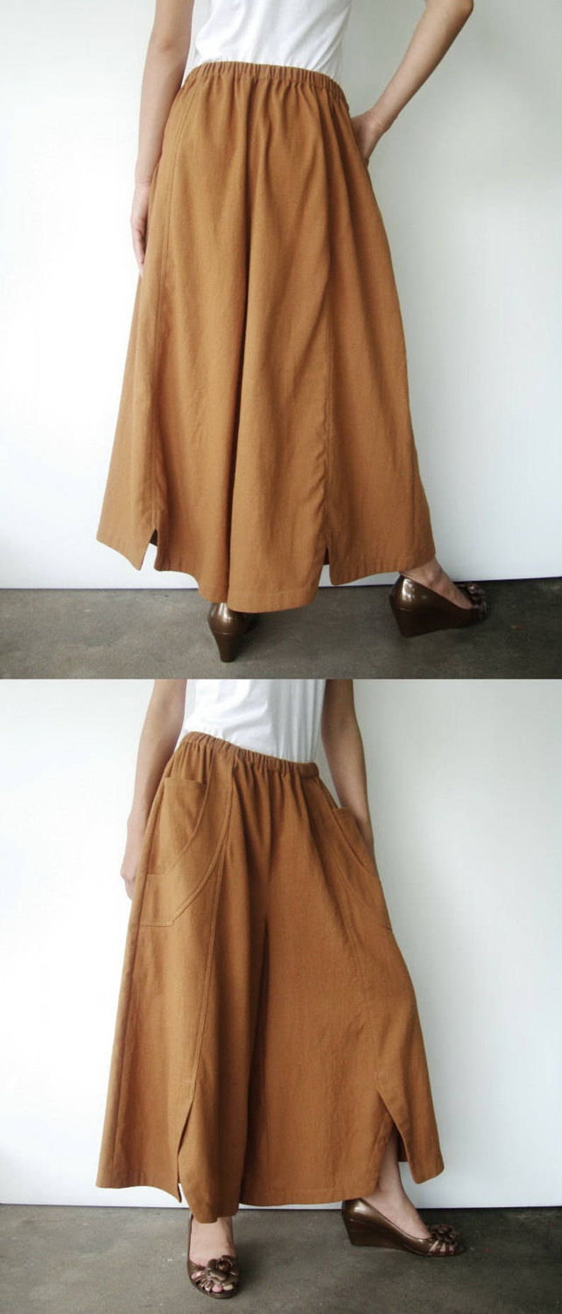 May include: A pair of brown wide-leg pants with a high waist and side slits. The pants have pockets on the front and are made of a lightweight fabric.